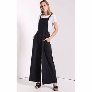 Black wide legged jumpsuit flare bottoms